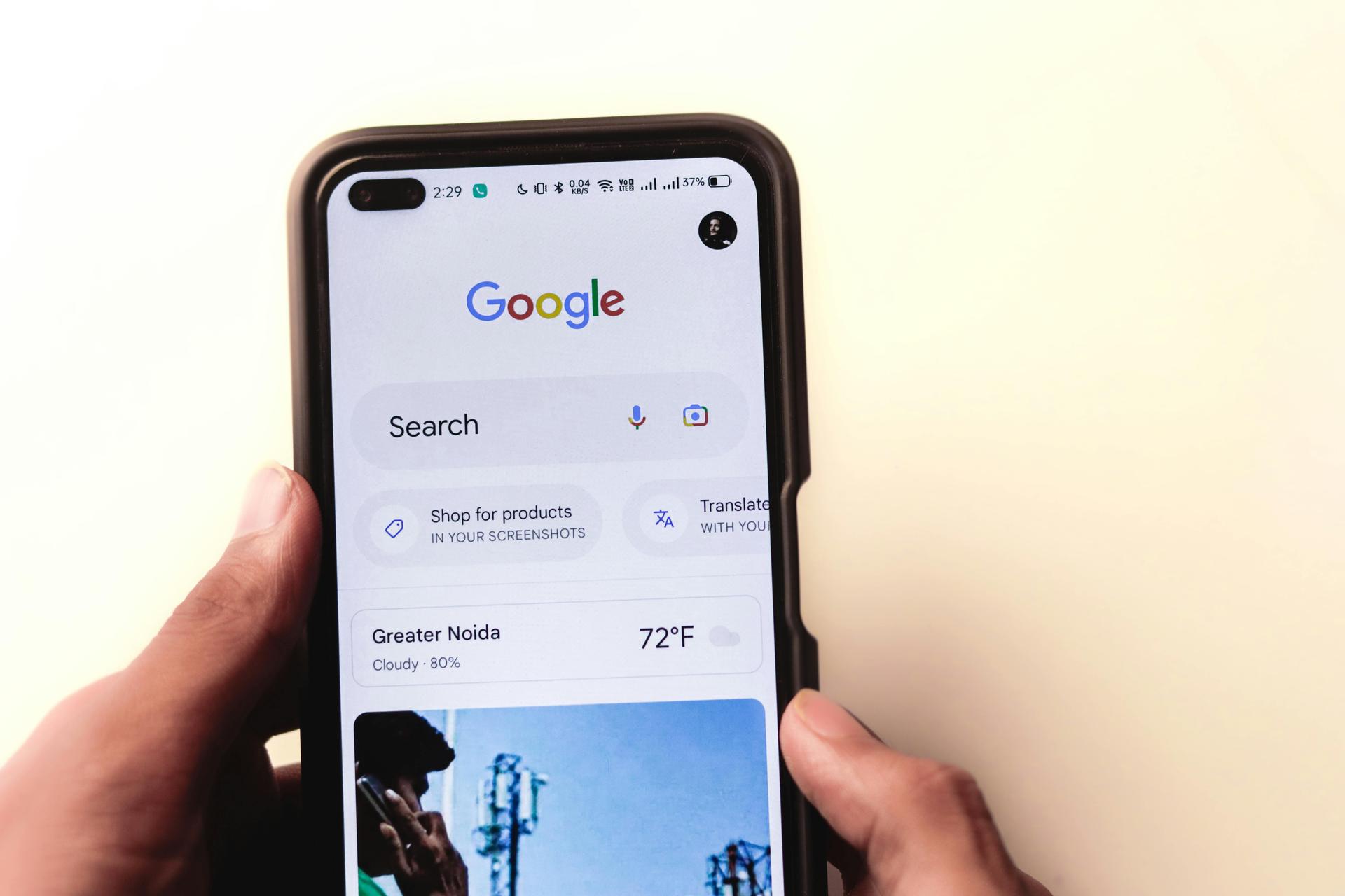 Cellphone displaying an image of a search engine