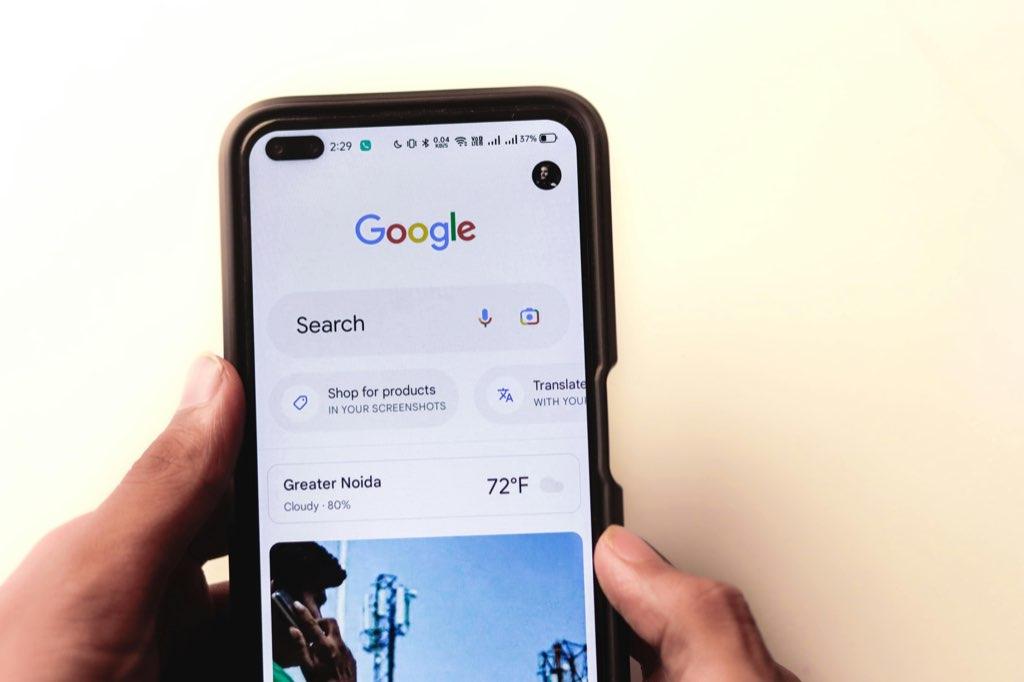 A customer scanning local search results on a smartphone before choosing a business