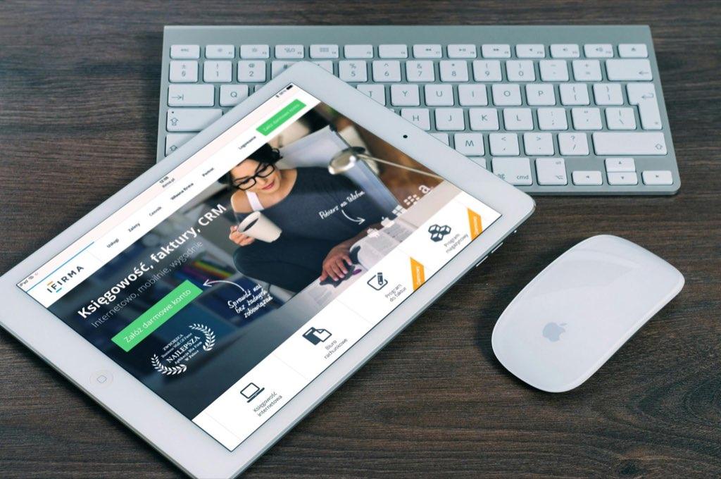A tablet showing a website highlights how design quality and trust cues shape first impressions.